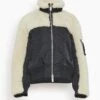 Sacai Faux Shearling X Nylon Twill Mix Blouson In Black X Ecru 1 Sacai Faux Shearling X Nylon Twill Mix Blouson In Black X Ecru -DOROTHE Clothing Shop fc73920a00ab25464923dfede9efe840