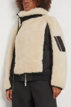 Sacai Faux Shearling X Nylon Twill Blouson In Black/Ecru 8 Sacai Faux Shearling X Nylon Twill Blouson In Black/Ecru -DOROTHE Clothing Shop sacai FauxShearlingxNylonTwillBlousoninBlackEcru 2