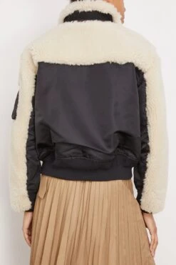 Sacai Faux Shearling X Nylon Twill Mix Blouson In Black X Ecru 9 Sacai Faux Shearling X Nylon Twill Mix Blouson In Black X Ecru -DOROTHE Clothing Shop sacai FauxShearlingxNylonTwillMixBlousoninBlackxEcru 3